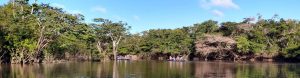 two canoes on the water at Caiman House, Guyana