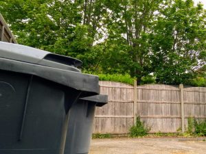 wheelie bins in a car park, Dorset